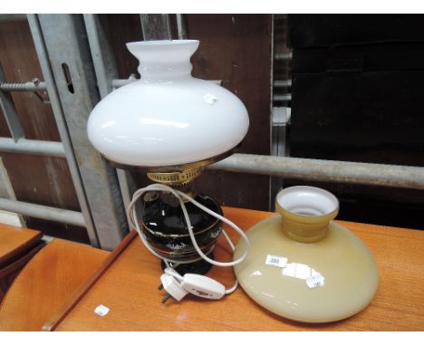 A modern paraffin style electric lamp