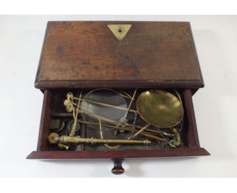 A set of 19th century mahogany cased brass apothecary scales