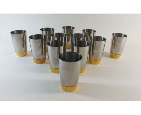 A set of twelve Viners Devlin silver plated tankards - all boxed