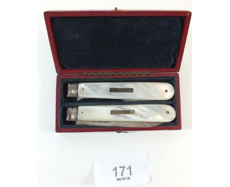 A silver and mother of pearl folding fruit knife and fork in fitted case by W. N