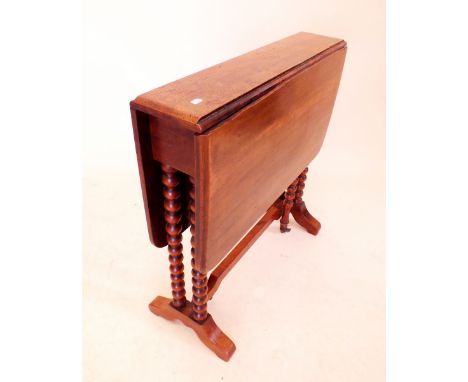 An Edwardian mahogany Sutherland table on bobbin turned supports - 51cm wide
