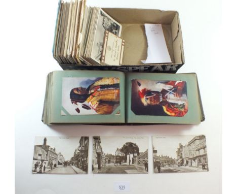 An album of North American cards including Indian Chiefs; French topo including L.Levy; GB topo with Poole High Street etc (2