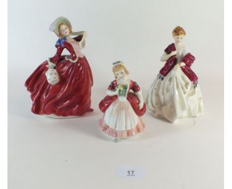 A Royal Worcester figure First Dance and two Royal Doulton figures Autumn Breezes and Valerie