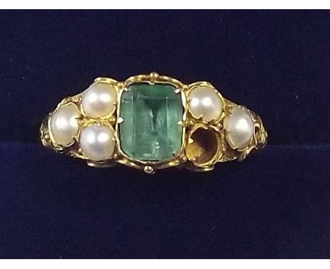 A Victorian gold ring set seed pearls and emerald - unmarked, and one pearl deficient - size N