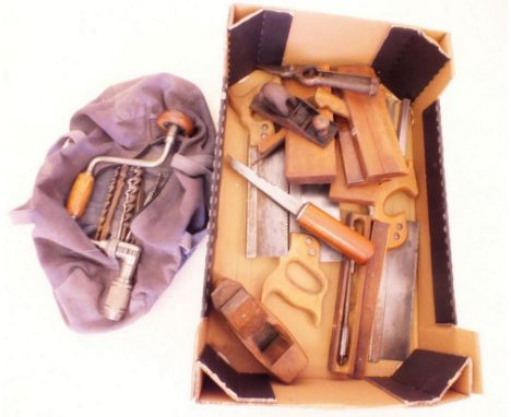 A box of old woodworking tools