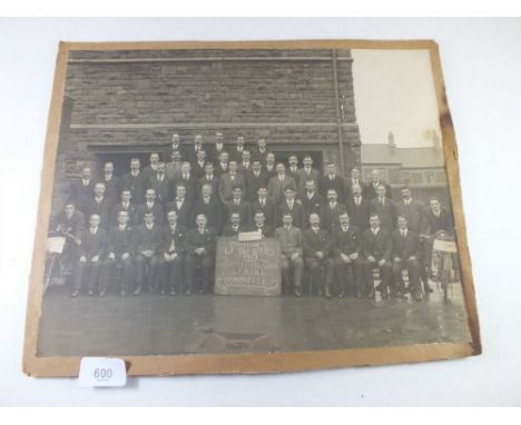 A black and white photograph portrait of the Pontypool Road Strike Committee commemorating Victory of the National Railway st