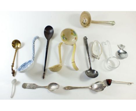 A small collection of spoons including Georgian cane ware shell bowl ladle, honey spoon, sealing wax spoon, Irish apsotle bog