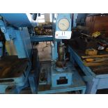 Rockwell hardness tester.