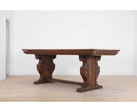 A 19th century provincial Italian Renaissance Revival long hall table, the plank top with cleated edge, egg &amp; dart moulde