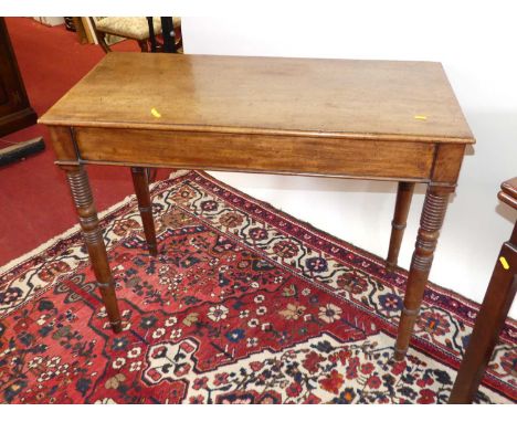 An early Victorian mahogany hall table, of plain rectangular form raised on ring turned supports, width 99cm