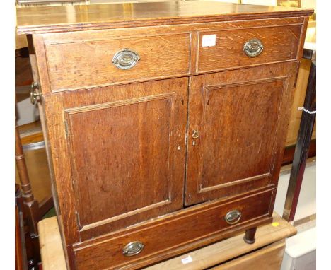A 19th century and later adapted oak hinge top low side cabinet (now a commode), width 64.5cm