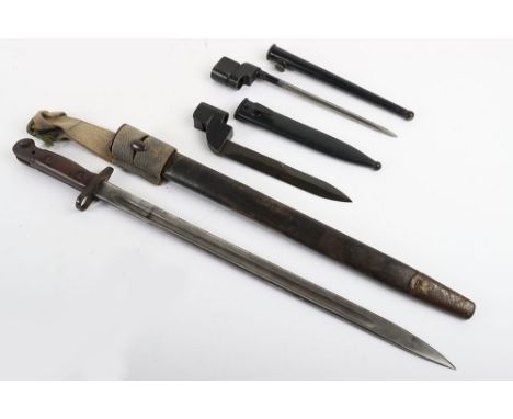 British 1907 Bayonet by Wilkinson, with two piece wooden grips, steel pommel with oil hole, cross guard with muzzle ring. Hou