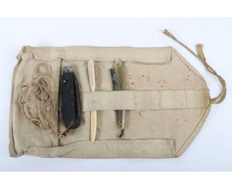 WW1 British Wash Roll with Partial Contents, cloth enlisted ranks wash roll containing a 1918 dated toothbrush , cut throat r