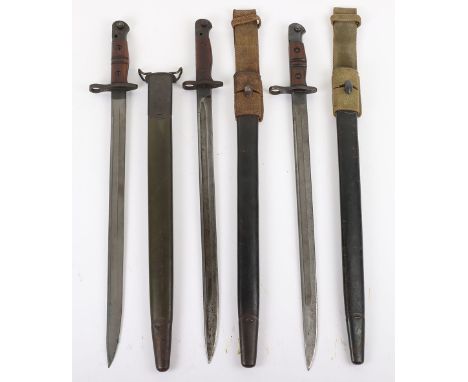 British 1907 Bayonet, with two piece wooden grips, oil hole to pommel, housed in leather and steel mounted scabbard with webb