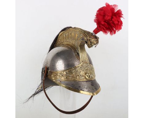 French 1870/74 Pattern Dragoon Helmet, being an enlisted ranks example with plated shell, brass front trim, central device wi