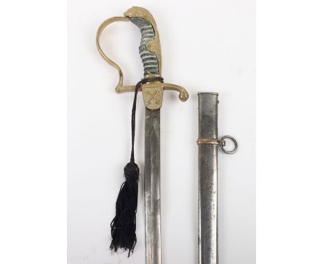 Imperial German Foot Artillery Officers Sword, with large gilt lion head pommel, grip missing its wire binding, langet with c