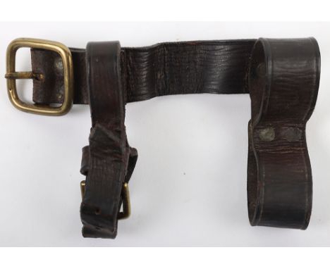 Scarce 1914 Leather Entrenching Tool Helve Carrier Attachment, fine example in brown leather with brass buckle fittings. Stam