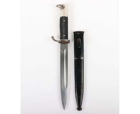 WW2 German Armed Forces Parade Bayonet, with two piece chequered grips, plated pommel and cross guard. Housed in its original