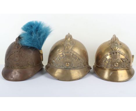 French Brass Fire Helmet, in the Adrian pattern with top comb. Complete with brass helmet plate to the centre, side plume soc