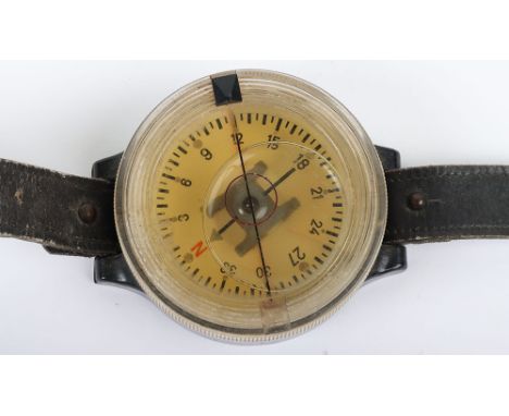 WW2 German Luftwaffe Aircrew Wrist Compass, good example of a liquid filled Luftwaffe issue wrist compass with its original s