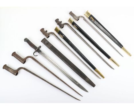 Selection of Bayonets, including two triangular socket bayonets in reproduction scabbards; reproduction triangular socket bay