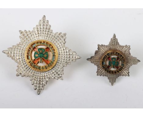 2x Irish Guards Officers Cap Stars, being a large and small field service cap size example. Both being two piece. Enamel cent