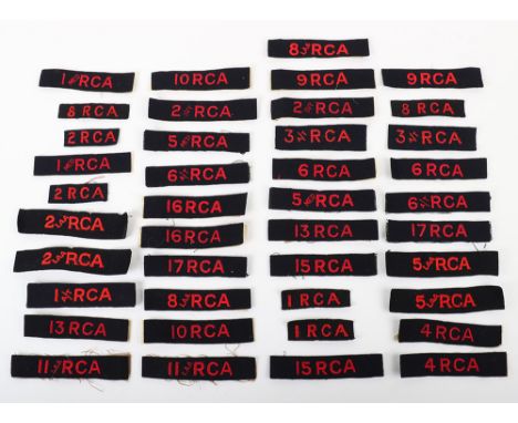 Grouping of Royal Canadian Artillery Cloth Regimental Shoulder Titles, all being embroidered red lettering on navy blue, incl
