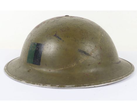 WW2 British Regimentally Marked Steel Combat Helmet, good example retaining a olive green paint finish to the exterior of the