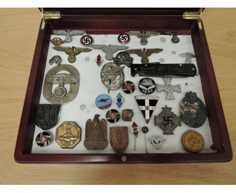 A display case containing 30+ German Badges, Cap Badges, Stick Pins, SS Pen Knife, nskk badge motor staffel, Nat. Soz. Frauen