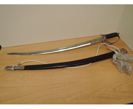 A Sword, possibly Indian having decorated curved blade with leather &amp; wooden scabbard, blade length 77cm, overall length 