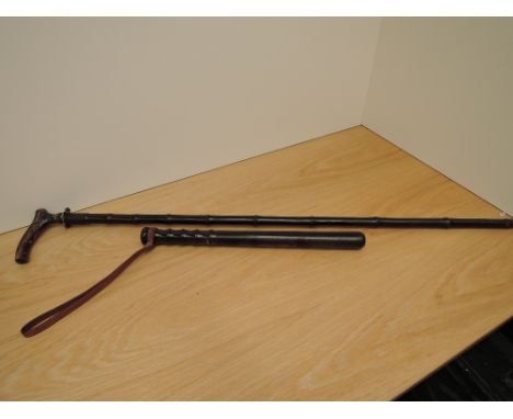 A Victorian Sword Stick with stag horn handle, blade length 53cm, overall length 91cm along with a later Truncheon with wrist