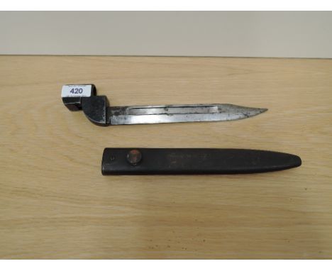 A British No9 Bayonet with steel socket and Bowie Knife blade, metal scabbard, blade marked 1464, blade length 20cm, overall 