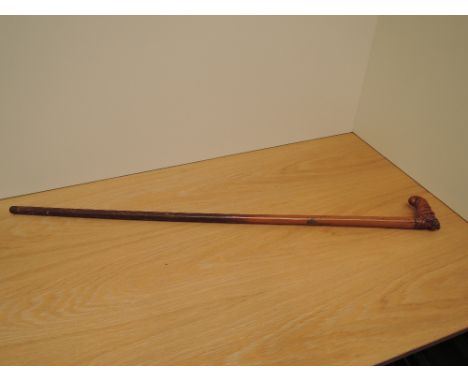 A Victorian Sword Stick having carved figural handle (af), blade length 25cm, overall length 88cm