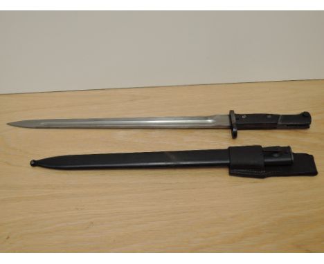 A German/Belgian Mauser Export Bayonet with metal scabbard, blade length 38cm, overall length 51cm