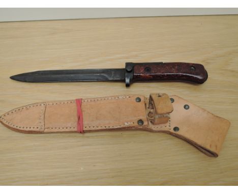 A 1950's Czechoslovakia VZ58 Bayonet with leather scabbard, blade length 16.5cm, overall length 17.5cm