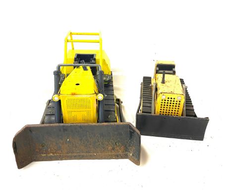 2 Vintage metal Tonka trucks largest measures approx 10 inches tall 17 inches wide 