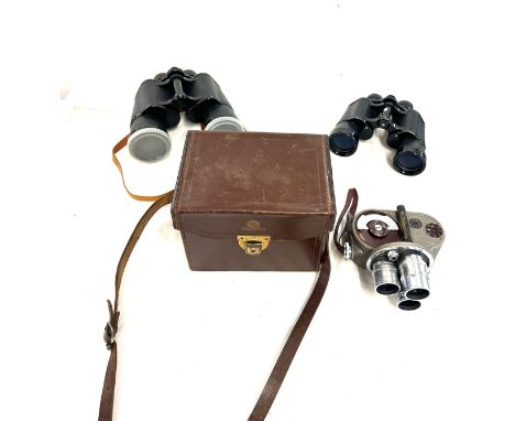 2 Pairs of vintage binoculars and a bell and howell viceroy 