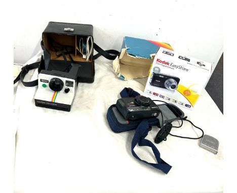 Selection of vintage and later cameras includes Polaroid, Kodak easy share etc 