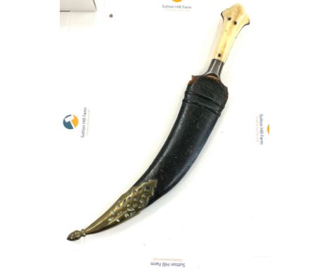 Antique 19th century Indian tiger tooth Jambiya dagger knife in leather covered wooden scabbard. Bone grips Total length 31cm
