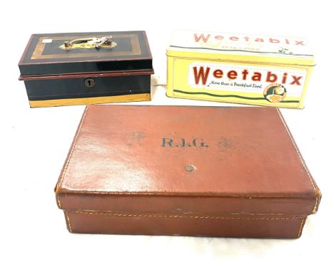 Vintage money tin with key, advertising Weetabix tin and a small leather suitcase 