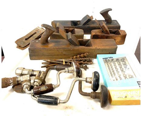 Large selection of vintage tools includes wood workers planes, drill bits, hand held drill etc 
