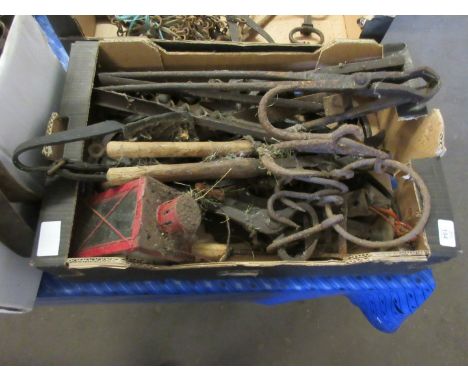 Box containing various vintage hooks, blacksmiths tools, drills, etc