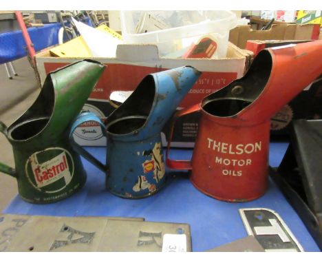 Oil can for Thelson tractor oils together with two others
