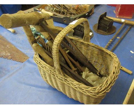 Basket containing quantity of various wooden handled vintage tools