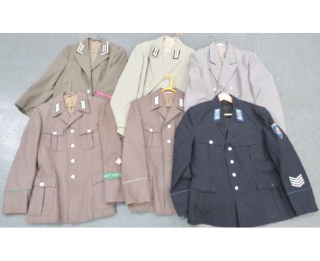 Six Various East German Army Tunic including light green example, complete with Officer collar badges ... 3 x field grey exam