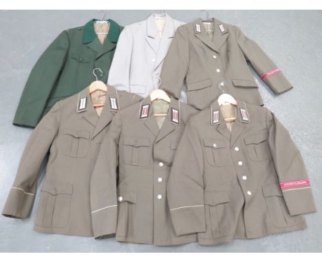 Six Various East German Army Tunics including 4 field grey examples complete with collar badges ... Grey example with dark gr