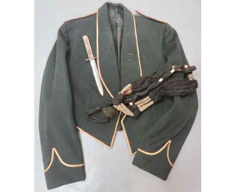 Officer’s Mess Jacket dark green mess jacket.  Turn back collar with gilt braid edging continuing across the base of the jack