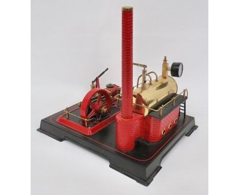 Wilhelm Schroder Gambh & Co Steam Engine. A very good example with brass boiler and red painted steel working parts.