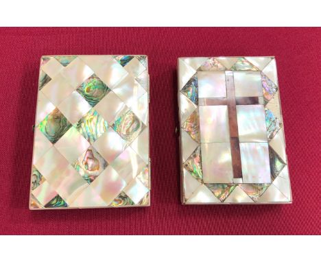 Two 19th century mother of pearl card cases One example with a Cross decoration and retaining interior divider. ... The secon