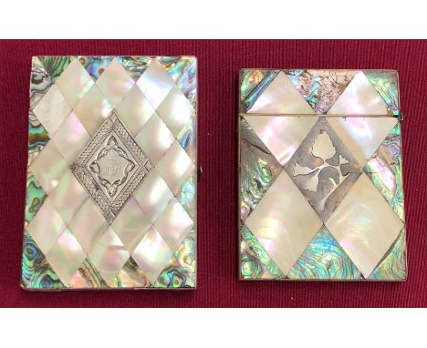Two 19th century mother of pearl card cases One example with a silver inlaid panel with engraved initials and retaining inter